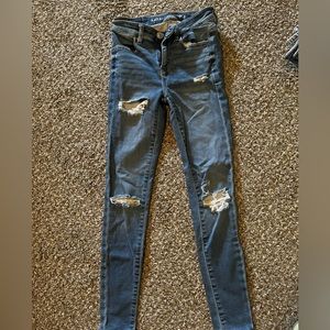 american eagle ripped dark wash skinny jeans